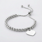 Adjustable Shiny Bead Bracelet with Heart Charm in Sterling Silver